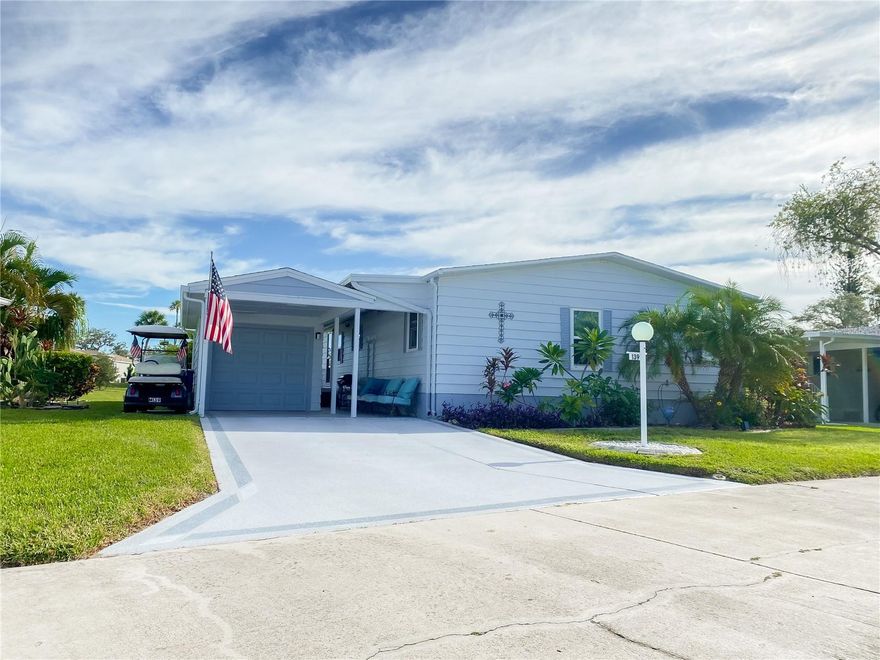 Price decreased to sell fast! Welcome to dreamy Florida living. This land-owned 2 bedroom 2 bath manufactured home resides in the highly desired area of Ellenton, FL nestled in the 55+ community of Ridgewood Meadow. Seated lake-front with expansive views and the most gorgeous sunrises, this is the ideal place to call your forever home. This home comes fully furnished and with the golf cart included in the purchase price, making for an easy transition into this home. Some notable features are the golf cart garage attached to the carport, an outside patio with views of the lake, an open concept floor plan and an en suite master bedroom with an attached spacious bathroom. This home boasts a 2021 roof, 2020 A/C unit and newer tie down straps and vapor barrier. This community also has a 24-hour guard service.