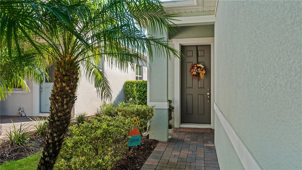 Photo of 1915 Flora Pass Place, Kissimmee, FL 34747 (MLS # O6449739)