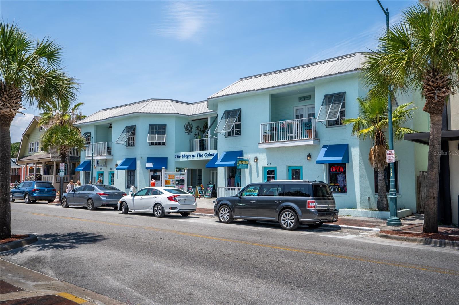 LOCATION, LOCATION, LOCATION! AMAZING opportunity to own in heart of New Smyrna Beach in the short-term rental district! This fully renovated property on Flagler Ave. can be yours to live in full-time or rent nightly. This 2 bedroom, 2 bathroom unit has an awesome view from the front balcony to enjoy your morning coffee. The primary bedroom is spacious and the second bedroom can also be used as an office with the ease of the Murphy bed. The kitchen boasts Quartz counter tops, solid wood cabinets, high-end Bosch stainless steel appliances and more. With 1,175 sq.ft., there is plenty of room to entertain. There is luxury vinyl plank and tile flooring throughout. This property will not last long, schedule your showing today. Live or rent where the fun happens!