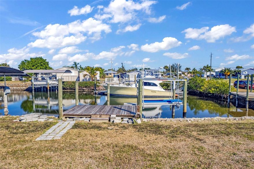 Punta Gorda, SAILBOAT ACCESS, and ZONED MHC?!?! With NO HOA FEES? What's that you say?? It also has 2 docks, one with a lift, and the water is already connected saving you impact fees?! Don't miss out on this rare opportunity to build the home you've always wanted on this oversized corner lot!