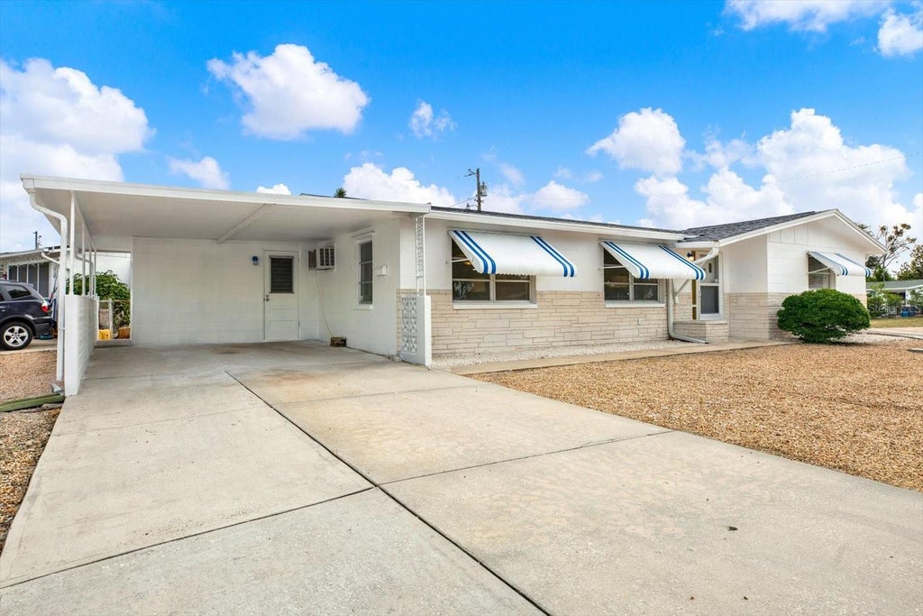 Photo of 1617 Derrick Street, Holiday, FL 34690 (MLS # TB8515302)