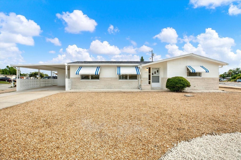Photo of 1617 Derrick Street, Holiday, FL 34690 (MLS # TB8515302)