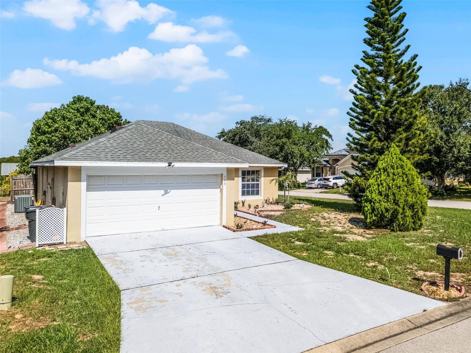 Welcome to this fully upgraded 3-bedroom, 2-bath single-family residence located on a spacious corner lot in sunny Davenport, Florida. From the moment you walk in, you’ll love the open-concept floor plan, NEWLY INSTALLED luxury vinyl flooring, and a modern kitchen with quartz countertops. The standout primary suite offers a spa-like retreat with a luxurious walk-in shower and UPDATED vanity—perfect for unwinding after a long day. Step outside to a large patio shaded by a mature mango tree, ideal for summer lounging or entertaining friends and neighbors. RECENT UPGRADES include fresh interior paint, and NEW vanities in both bathrooms. Located just minutes from Highway 192, Publix, and Disney-area attractions, this home combines everyday convenience with endless entertainment options. Whether you're looking for your forever home or a smart investment, this one checks all the boxes. PLUS this home can be purchased with NO MONEY
DOWN!!! Schedule your showing today!