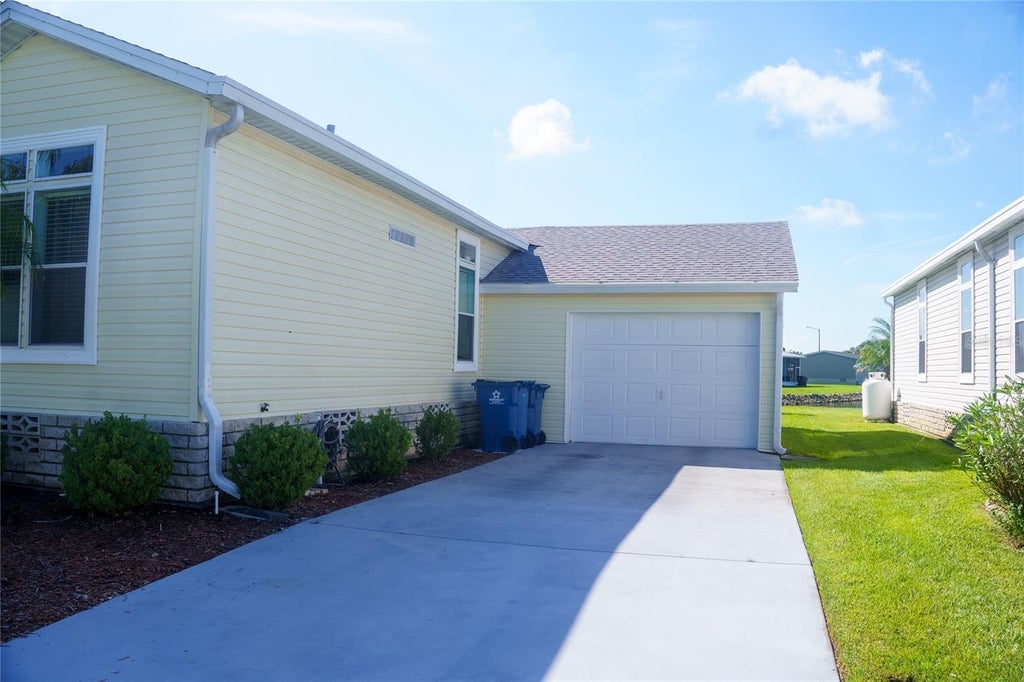 Photo of 3000 Us Highway 17 92 W Lot 553, Haines City, FL 33844 (MLS # S5157415)