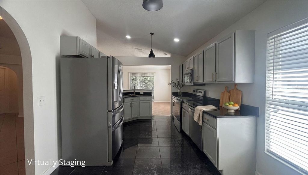 Photo of 10827 Laxton Street, Orlando, FL 32824 (MLS # O6393357)