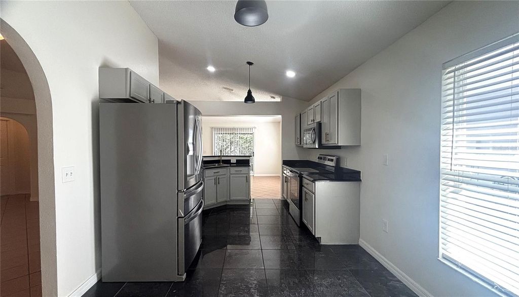 Photo of 10827 Laxton Street, Orlando, FL 32824 (MLS # O6393357)