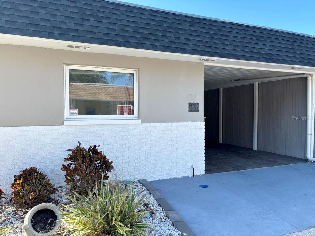 Photo of 156 Portree Drive, Dunedin, FL 34698 (MLS # TB8497760)