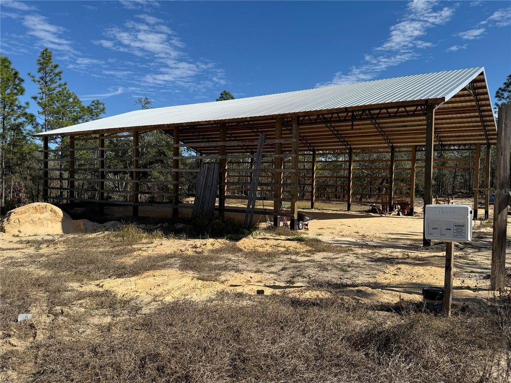 Photo of 16386 Kakawi Road, Brooksville, FL 34614 (MLS # OM716707)