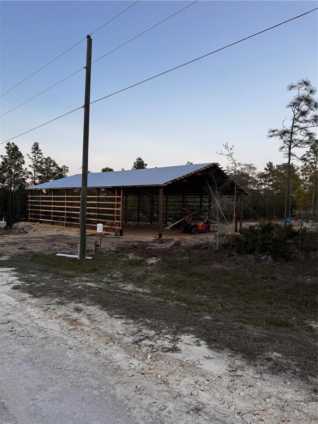 Photo of 16386 Kakawi Road, Brooksville, FL 34614 (MLS # OM716707)