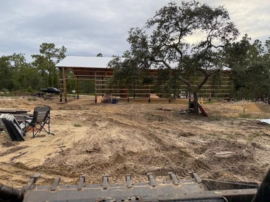 Photo of 16386 Kakawi Road, Brooksville, FL 34614 (MLS # OM716707)