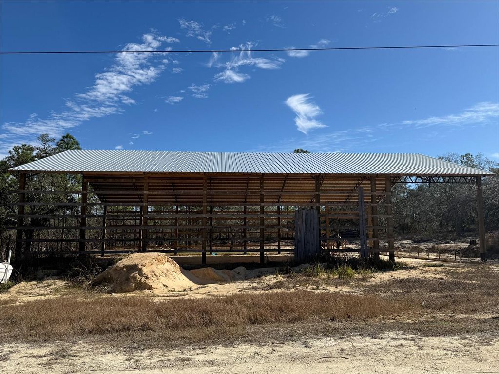 Photo of 16386 Kakawi Road, Brooksville, FL 34614 (MLS # OM716707)