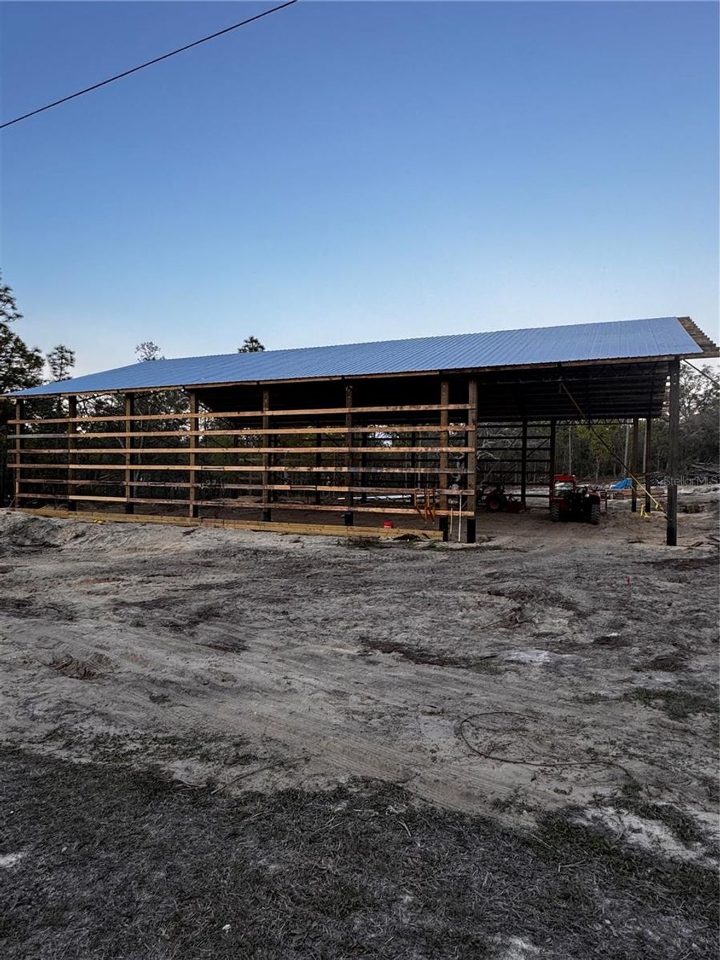 Photo of 16386 Kakawi Road, Brooksville, FL 34614 (MLS # OM716707)