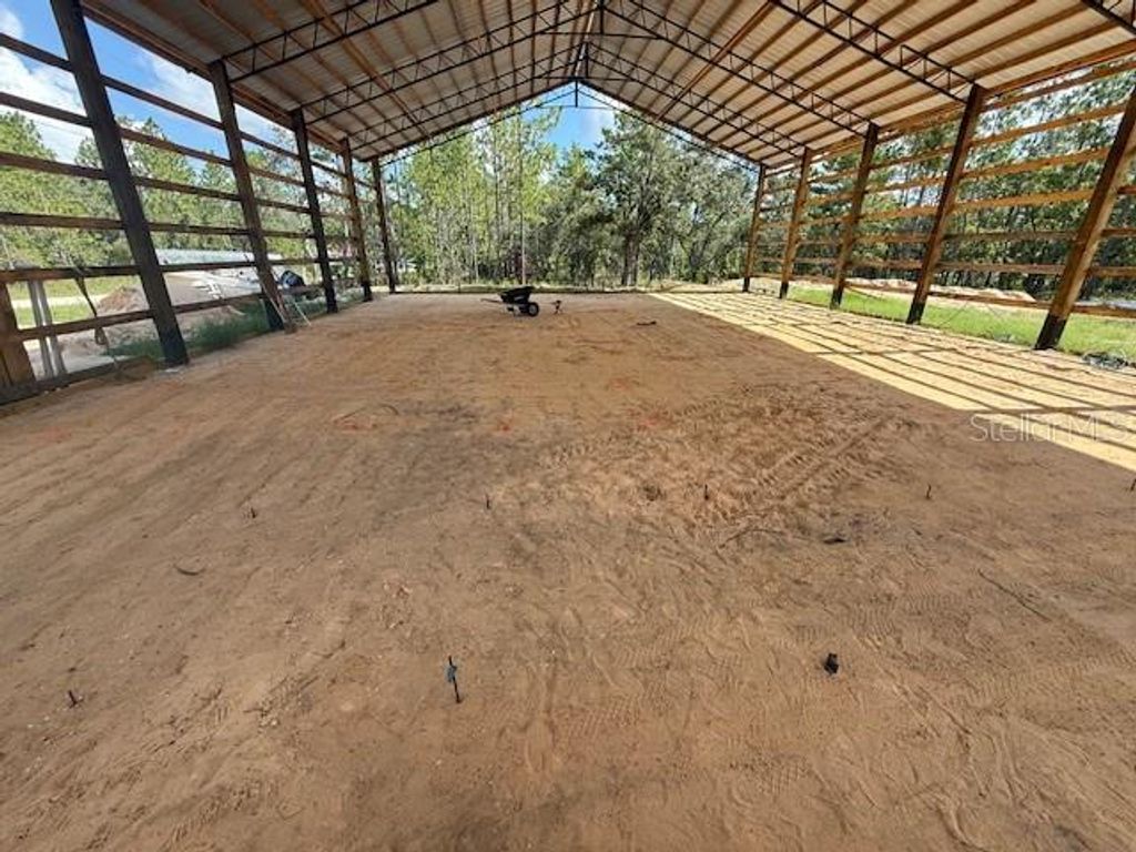 Photo of 16386 Kakawi Road, Brooksville, FL 34614 (MLS # OM716707)