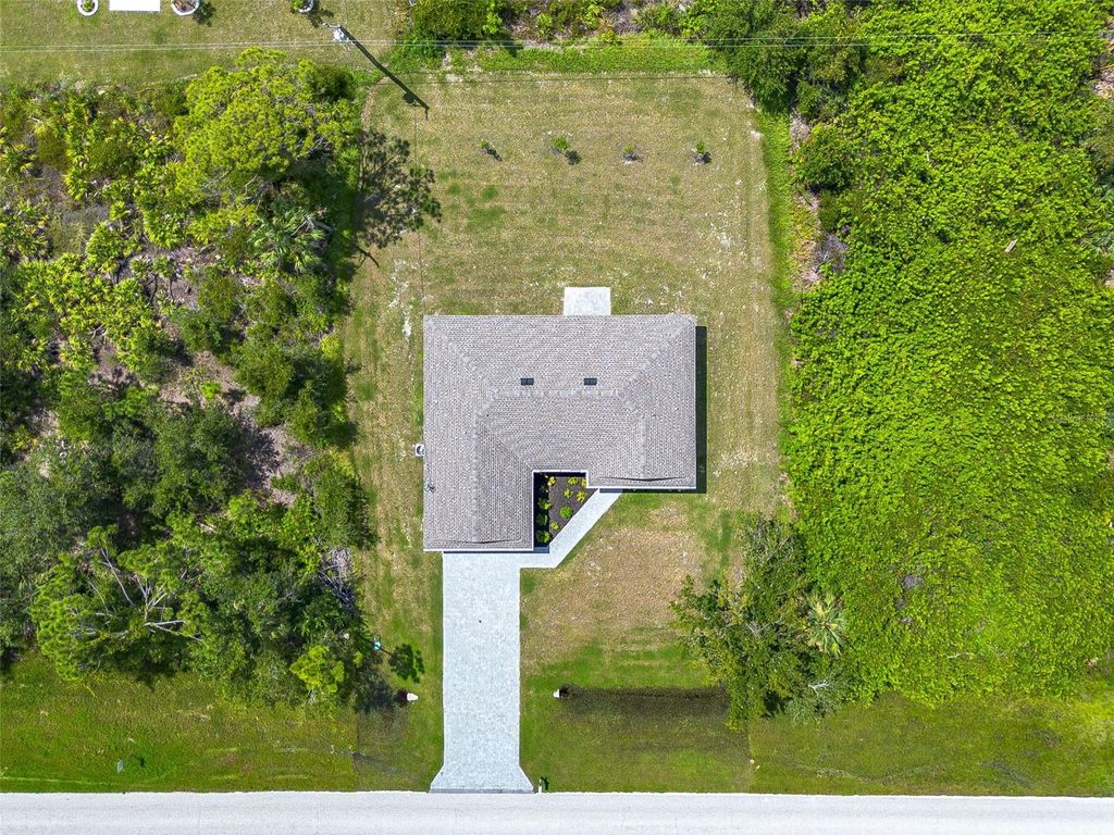 Photo of 6007 Gillot Boulevard, Port Charlotte, FL 33981 (MLS # T3465590)