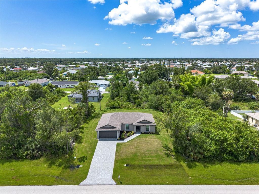 Photo of 6007 Gillot Boulevard, Port Charlotte, FL 33981 (MLS # T3465590)