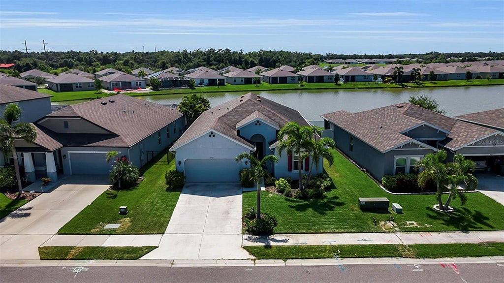 Photo of 4505 Windy Hammock Way, Palmetto, FL 34221 (MLS # A4703298)