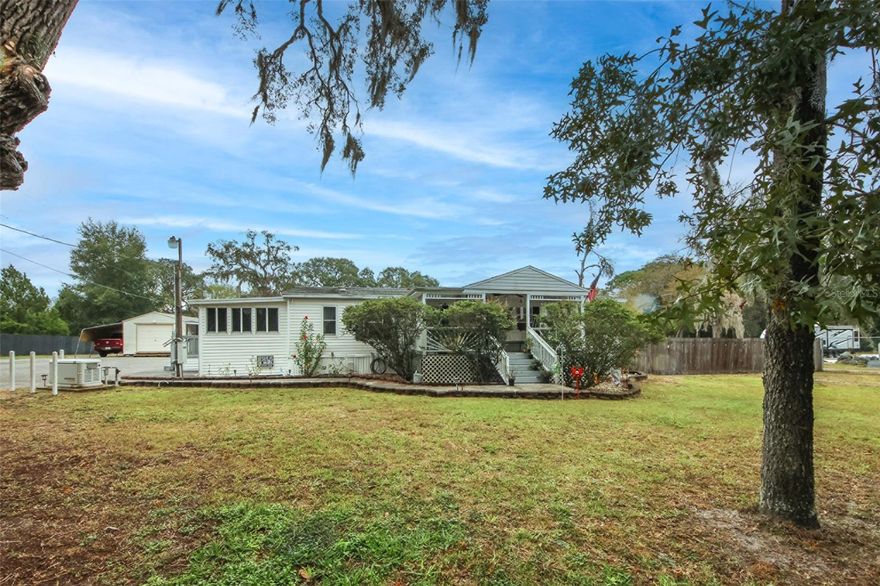 3 Bed, 2 bath Pool Home with office  and Oak trees, out of the flood zone.  1.7 Acre Parcel with an extra large Aluminum entertainment room in the back not listed in the main Sq footage.   Detached Garage with a carport for 2 cars ,Whole house Generator and a well in great shape.New flooring installed and bathroom remodeled. New appliance in kitchen.  Roof re-sealed Oct 2023     Large landscaped land giving tithe old Florida look.