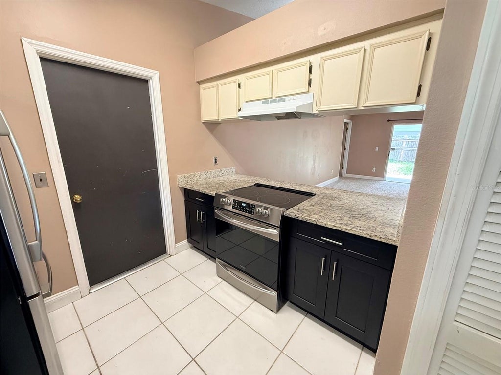 Photo of 14050 Ithaca Way, Orlando, FL 32826 (MLS # O6442272)