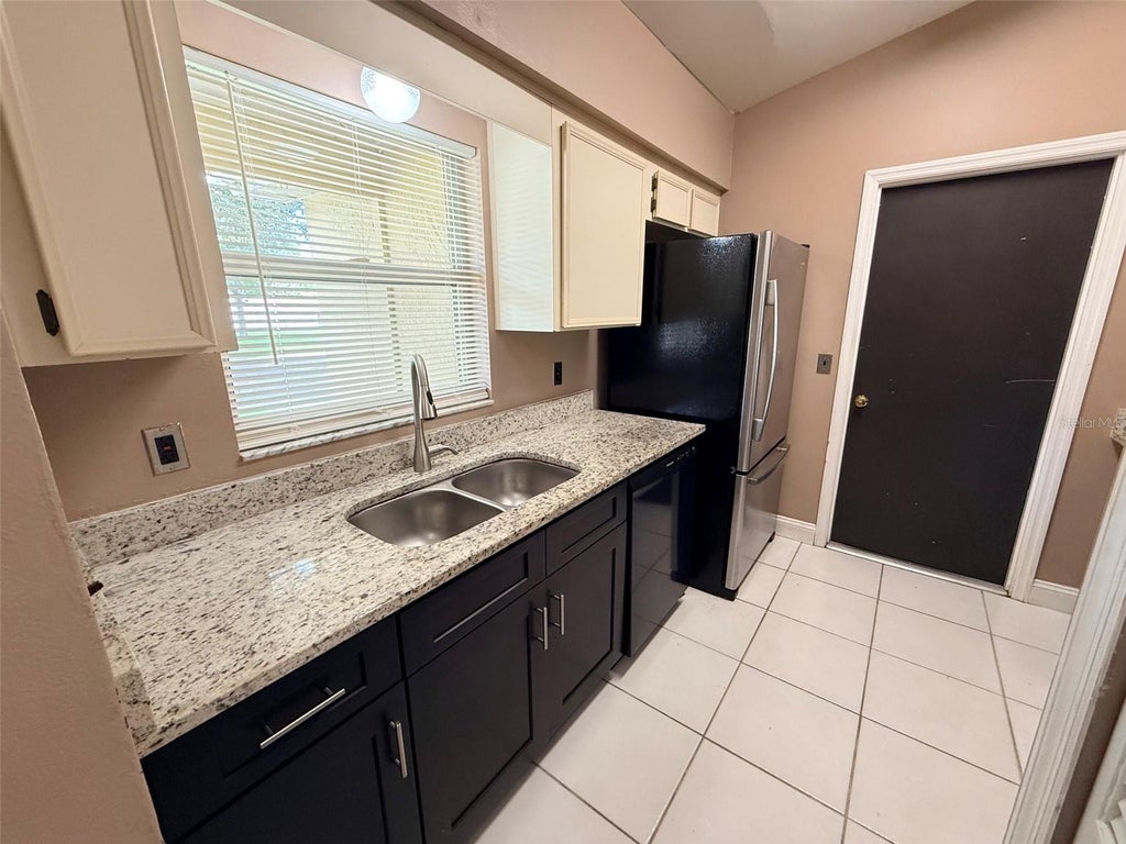Photo of 14050 Ithaca Way, Orlando, FL 32826 (MLS # O6442272)