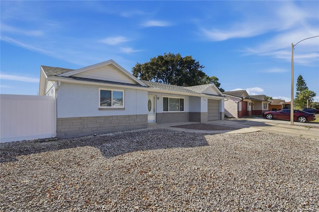 Photo of 7420 Sandalwood Drive, Port Richey, FL 34668 (MLS # TB8466665)