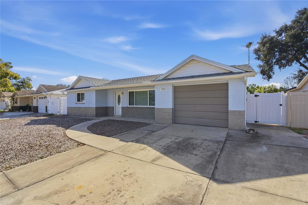 Photo of 7420 Sandalwood Drive, Port Richey, FL 34668 (MLS # TB8466665)