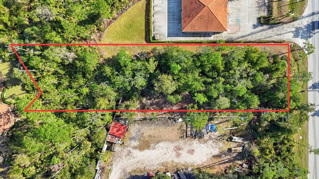 Photo of 19 Utility Drive, Palm Coast, FL 32137 (MLS # FC315447)