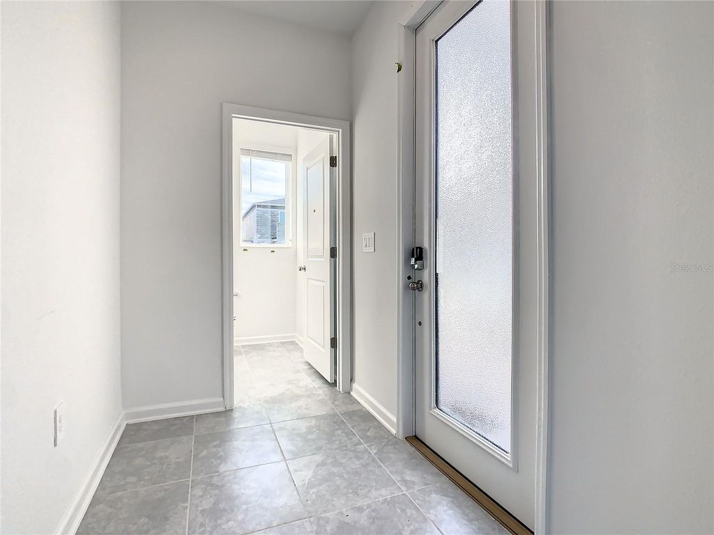 Photo of 409 Bogey Drive, Davenport, FL 33896 (MLS # S5144662)