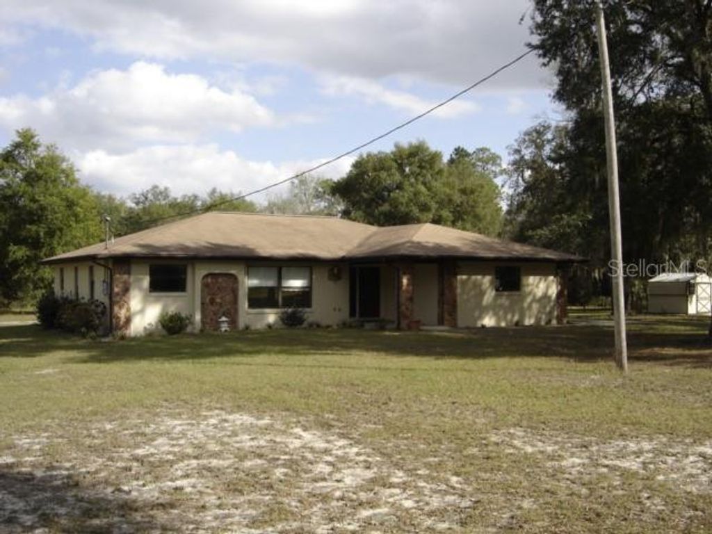 Photo of 3207 E Withlacoochee Trail, Dunnellon, FL 34434 (MLS # OM719739)
