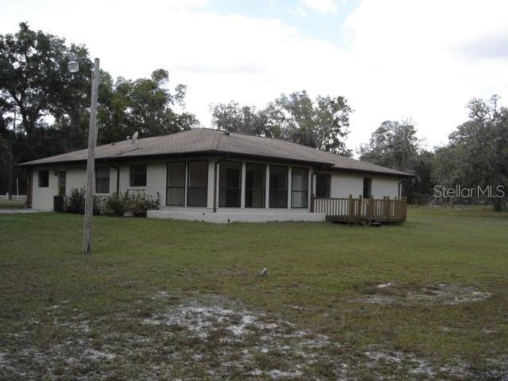 Photo of 3207 E Withlacoochee Trail, Dunnellon, FL 34434 (MLS # OM719739)