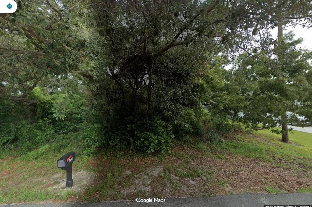 Photo of 11331 Blythville Road, Spring Hill, FL 34608 (MLS # O6360439)