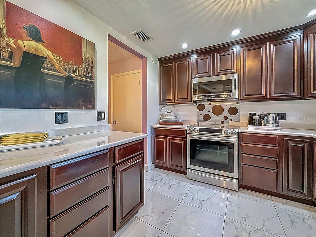 Photo of 110 Aspen Circle, Seminole, FL 33777 (MLS # TB8463000)