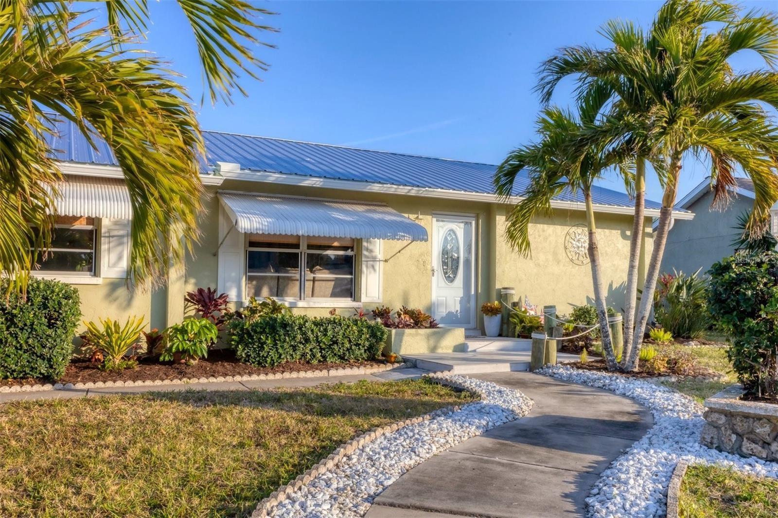 If living on the water is something you desire then this 2 bedroom, 3 bath home is something to see! Lovely single family home located in the highly sought after community of Coral Shores East in NW Bradenton complete with screened pool and dock!! Spacious layout with the living, dining, kitchen rooms opening to a Florida/ lanai room and screen pool lanai. This bright and light split plan with master bedroom on one side of house with huge walk-in closet and on suite bathroom with shower. Other side of house features the guest bedroom, bathroom. There are many recent updates to include - updated kitchen with GE stainless steel appliances, built-in wall oven and induction cook top. Also recently completed, new pool screens, updated outdoor patio deck, resurfaced pool with updated plumbing, heater and spa, updated electrical and dock, updated sprinkler system which runs on a well thus keeping water costs down! The pool area features a tiki bar, water feature and bathroom with shower. Theres plenty of closet space, tiled in main areas and carpet in living room and bedrooms. Nice size 2 car garage with storage space and washer/dryer ready for your use!. Ideal location with direct access to the Gulf of Mexico just minutes by boat, perfect for boaters and fishing. A short drive over the Cortez Bridge to beautiful beaches of Bradenton beach, Coquina beach and Anna Maria beach. Short distance to IMG, US41, downtown Bradenton, Blake Memorial Hospital. Not far from I-75, US301, Sarasota, downtown Sarasota. Tropical living. Paradise under the Sun… reserve it before it’s gone. Available now. Annual, unfurnished. Pets are welcome! Lawn and pool care included in rent. Non smoking residence. Requirements: Background check, First, Last & Security, Income must equal or be greater than 2 times monthly income.