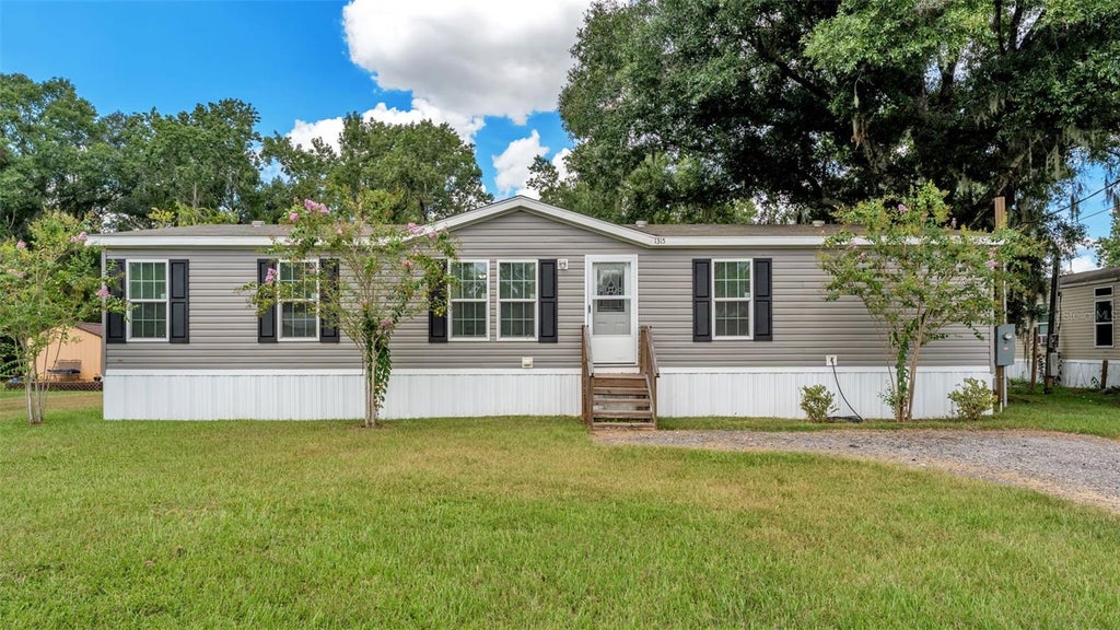 Photo of 1315 Windsong Drive, Lakeland, FL 33811 (MLS # L4964652)