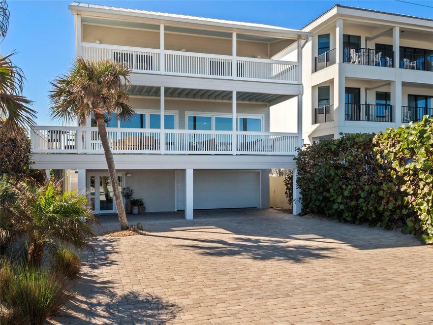 Luxury Ocean-Front Home at New Smyrna Beach! Secluded on the Bethune Beach, non-driving section of New Smyrna. You will love this peaceful retreat with views you can’t beat. This meticulously renovated 3-level home features 2 primary king suites, 1 guest bedroom, 3 full baths and 2 half baths. This home will comfortably sleep 6 guests with plenty of space for everyone. A blend of timeless design and coastal minimalism, this home has been completely renovated with brand-new, high-end fixtures, appliances and furniture (included with sale). Renovation features Thermador appliances, PGT coastal impact windows and doors, Maytag washer and dryer, Emtek hardware, Sony TVs, Carrier interior and exterior AC units, Minka fans, wide plank European White Oak floors, Restoration Hardware and Pottery Barn furniture. Enjoy the expansive, covered, wrap-around outdoor living space that has been furnished with Kingsley Bate teak furniture, creating the perfect setting to take in the beautiful views and salt breeze. The outdoor space is accessible from both the first and second floor and has been updated with new decking, privacy fence, mature landscape, bronze outdoor lighting, cedar sauna unit, Redwood Outdoors cold plunge/hot tub, Minka outdoor fans, fire pit, and grill. This covered outdoor deck space offers the perfect space for relaxation or entertainment. A rare opportunity to own a beach front home in New Smyrna that truly has it all, is move in ready and absolutely no work needed. Start your next chapter here, where every day feels like a vacation and every memory made will last a lifetime.