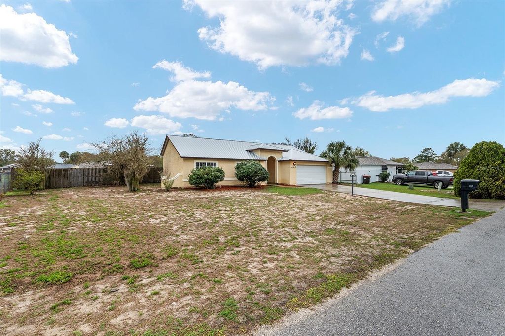 Photo of 306 Oak Track Radial, Ocala, FL 34472 (MLS # OM721150)