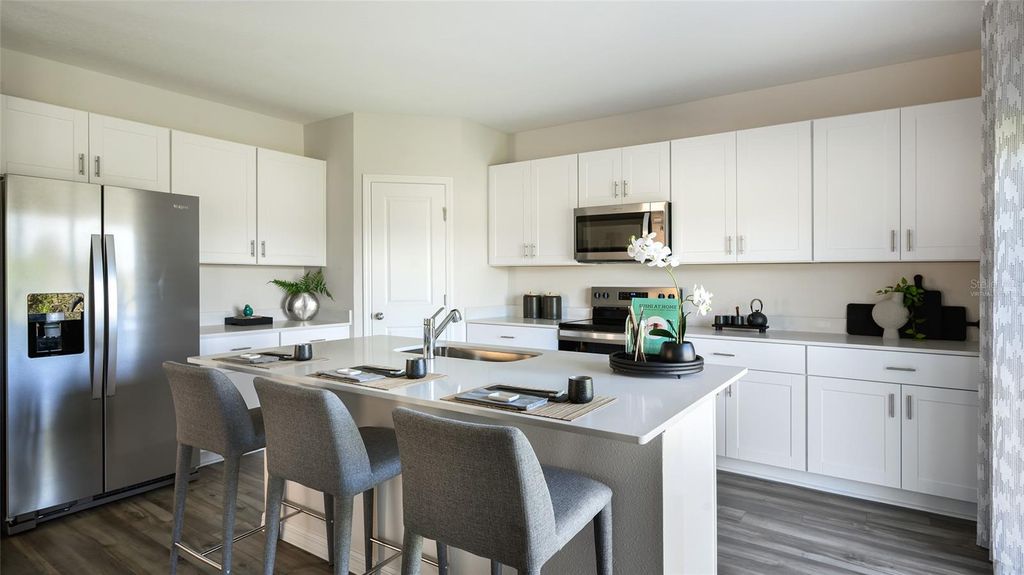 Photo of 5389 San Pietro Drive, Winter Haven, FL 33884 (MLS # TB8482823)