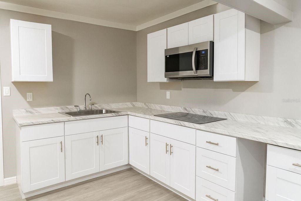 Photo of 4739 Elkmont Road, Orlando, FL 32808 (MLS # O6363623)