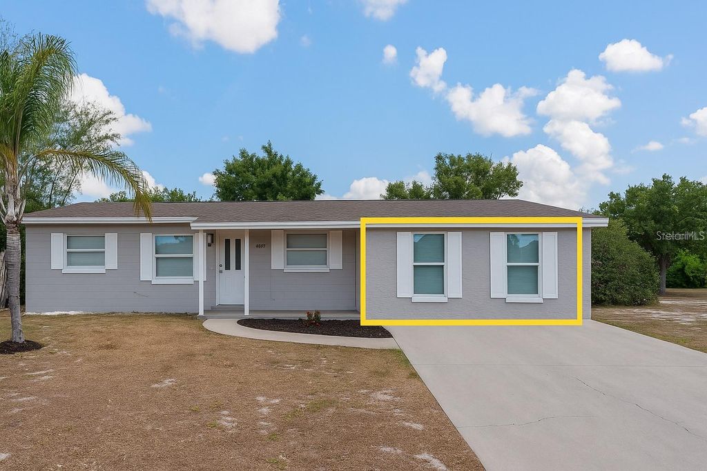 Photo of 4739 Elkmont Road, Orlando, FL 32808 (MLS # O6363623)