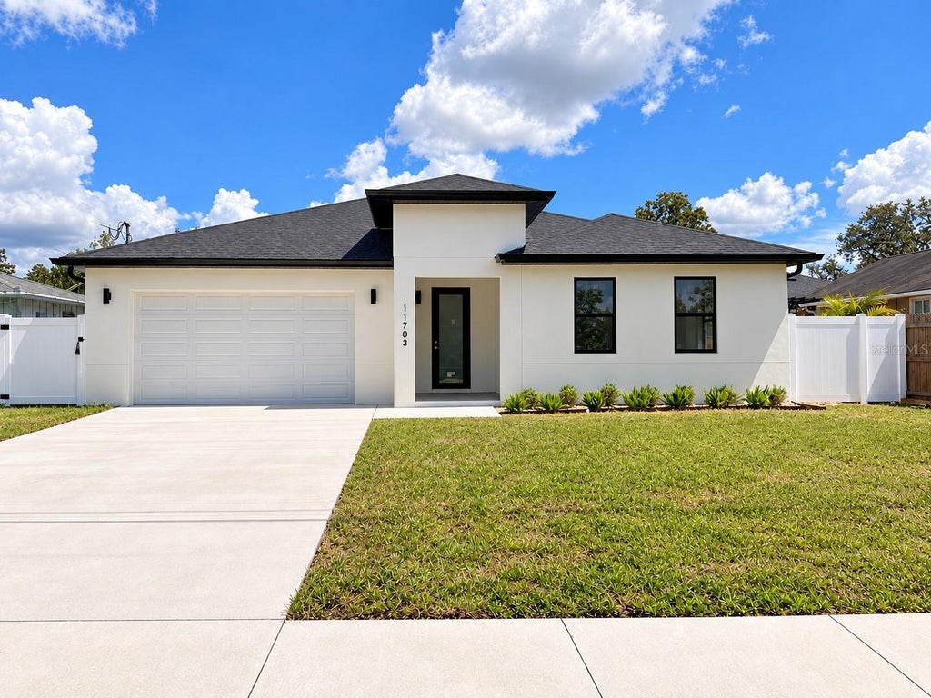 Photo of 11703 Country Club Place, Tampa, FL 33612 (MLS # O6446721)