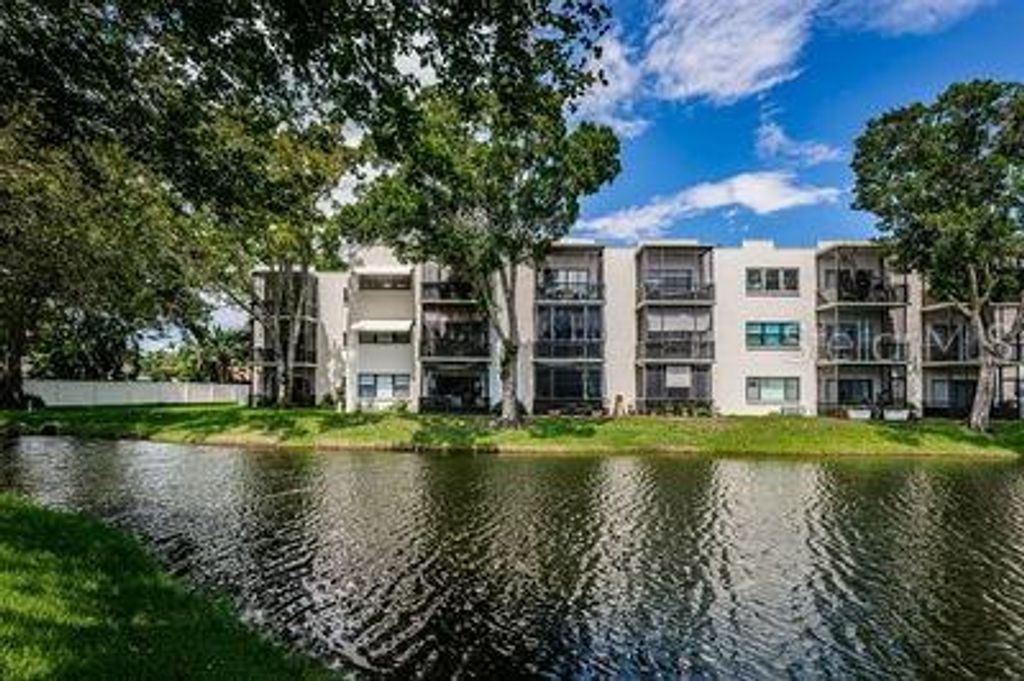 Photo of 5980 Terrace Park Dr #313, St Petersburg, FL 33709 (MLS # TB8470192)