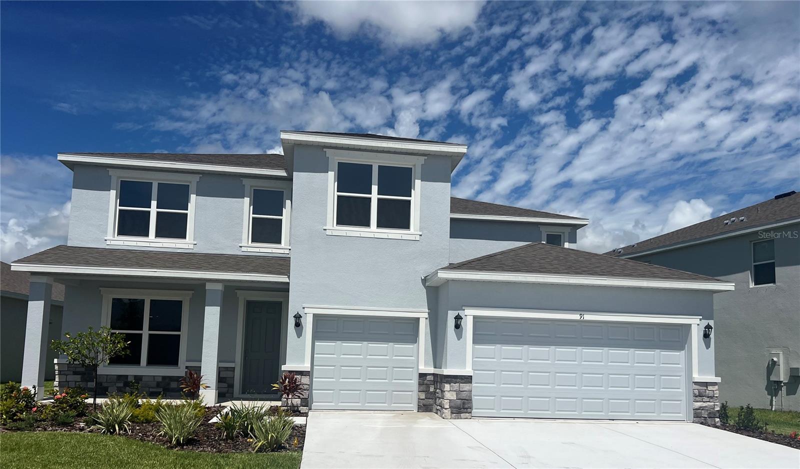 MOVE IN READY! Receive up to $20,000 towards closing cost and special interest rates with our preferred lender NOW until August 17th. Self-guided tour available on this quick move-in home every day from 7am-9pm. Stop by to tour on your own time. This two-story, all concrete block constructed home features a spacious kitchen overlooking the great room, dining area, and covered lanai. The flex room adjacent to the foyer provides additional space for work or play. A spacious guest bedroom and full bathroom complete the first floor. Upstairs, the Bedroom 1 with Bathroom 1, three additional bedrooms, a third full bathroom, and a well-appointed laundry room surround a spacious bonus living area. This home comes with a stainless-steel dishwasher, electric range, and microwave already installed. Pictures, photographs, colors, features, and sizes are for illustration purposes only and will vary from the homes as built. Home and community information including pricing included features, terms, availability, and amenities are subject to change and prior sale at any time without notice or obligation.