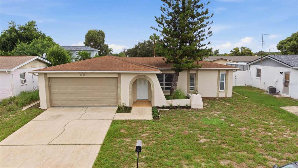 Photo of 8207 Dedham Drive, Port Richey, FL 34668 (MLS # TB8535779)