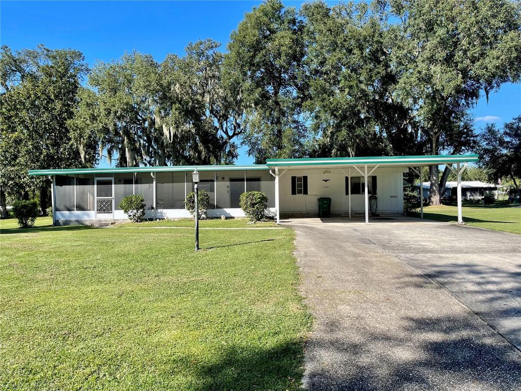 Photo of 353 Ivanhoe Circle, Lady Lake, FL 32159 (MLS # G5103616)