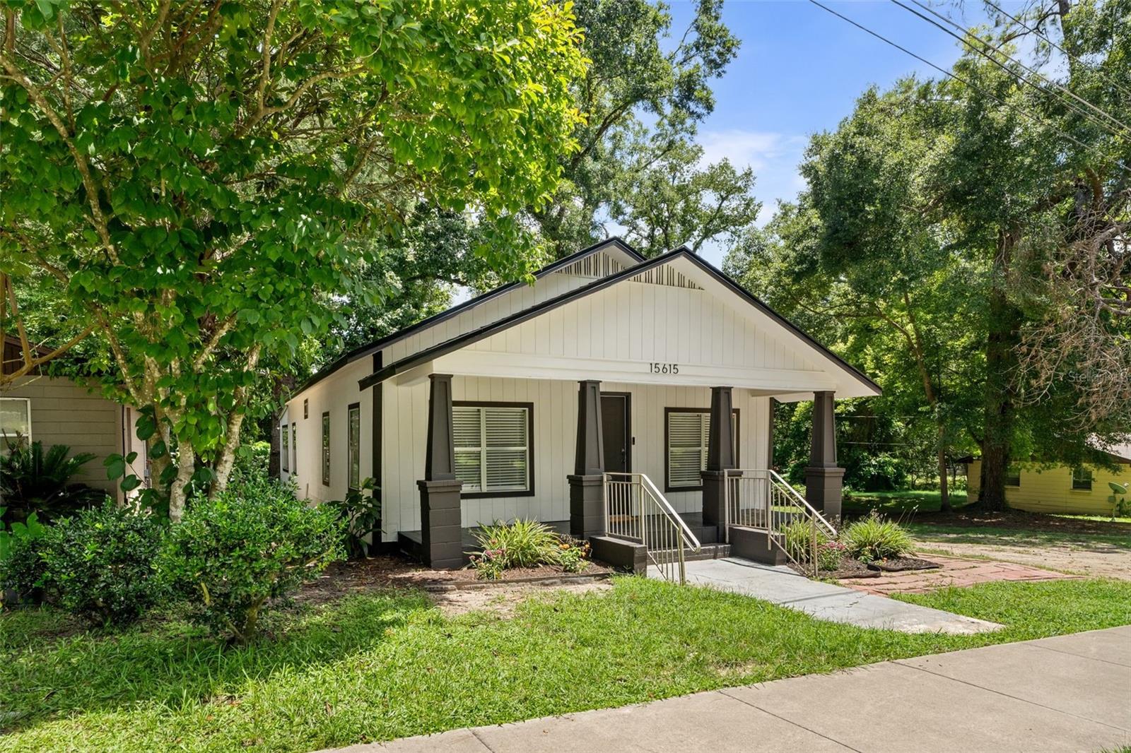 Charming and move-in ready, this beautifully remodeled cottage is perfectly situated near downtown Alachua and just steps from Maude Lewis Park, featuring a playground and basketball courts. Conveniently located close to US-441, this home offers easy access to surrounding areas.
Recent upgrades include a new roof (2025), AC (2022), water heater (2025), and luxury vinyl plank flooring throughout, freshly painted in and out. The light-filled, open layout boasts spacious living room & dining areas, three bedrooms & 2 full baths! Stylish new fixtures and fans in all the bedrooms! The kitchen features stainless steel appliances, a big nice new sink and maybe enough space for an island, if you want to add later on! The bathrooms have been tastefully renovated, adding to the home’s fresh, modern appeal. Exterior updates enhance the home’s curb appeal with design finishes adding to its well appointed look! PVC pipes in the home and electrical updates provide peace of mind (pls verify). The primary suite is large and can probably house your at-home workspace. It has a walk in closet, additional closet and stunning bath with double vanities and walk in shower. At this price, a property this gorgeous won’t last—schedule your showing today and make this delightful cottage your own! Washer, dryer, security cams convey!