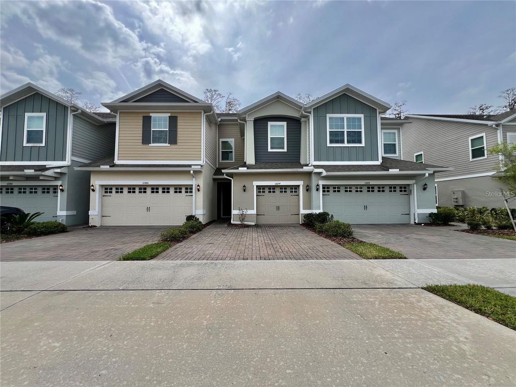 Photo of 6874 Tussilago Way, Orlando, FL 32822 (MLS # O6399237)