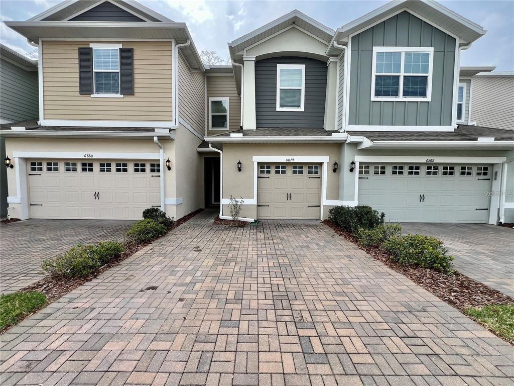 Photo of 6874 Tussilago Way, Orlando, FL 32822 (MLS # O6399237)