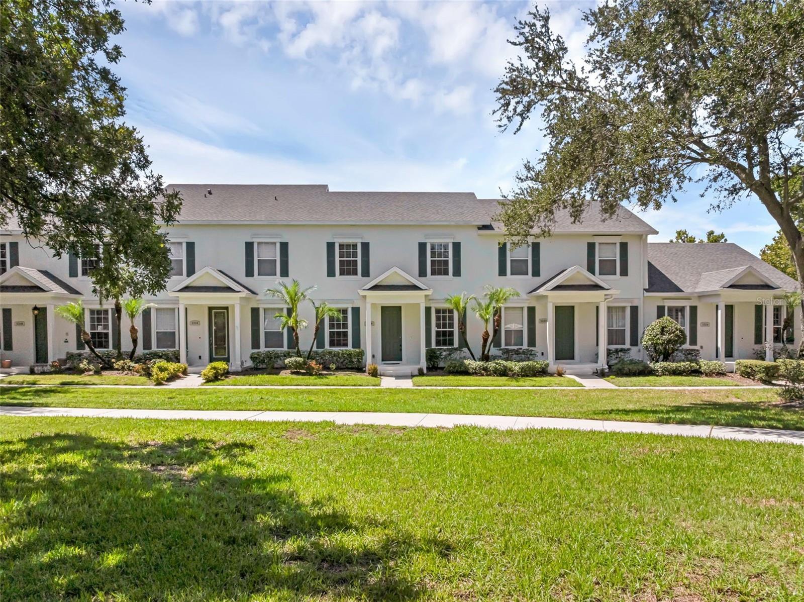 This beautifully updated three-bedroom townhome in Windermere offers the perfect blend of comfort, convenience, and location, with the primary suite thoughtfully located on the first floor. Situated in the desirable Summerport community, this home enjoys a picturesque setting just steps from a tranquil stocked pond and fishing pier right outside your front door. Inside, the open layout creates an inviting atmosphere, with a spacious great room seamlessly connected to the kitchen, making it ideal for both daily living and entertaining. The downstairs owner’s suite provides a private retreat, while two additional bedrooms and a full bath upstairs offer space for family, guests, or a home office. A covered and screened lanai extends your living space outdoors, and the large rear-entry two-car garage adds both convenience and curb appeal.
Recent updates, including new tile floors, plush carpeting, modern appliances, and a new AC system, make this home move-in ready for its next owner. Even the washer and dryer are included. Summerport residents enjoy an exceptional array of amenities, from the community clubhouse and fitness center to tennis and basketball courts. Exterior maintenance is included in hoa dues, allowing for a truly low-maintenance lifestyle. Miles of scenic hiking trails and numerous fishing piers throughout the neighborhood provide endless opportunities to relax and enjoy the outdoors.
Education is a highlight here, with sought-after K–12 schools including Windermere High School, and close proximity to prestigious private options like Windermere Preparatory School and Foundation Academy. The location also offers unmatched convenience, with Walt Disney World just 15 minutes away, Downtown Winter Garden within easy reach, and Downtown Orlando only 20 minutes from your doorstep. Surrounded by countless shopping and dining destinations, this home offers the rare combination of peaceful surroundings and everyday accessibility.