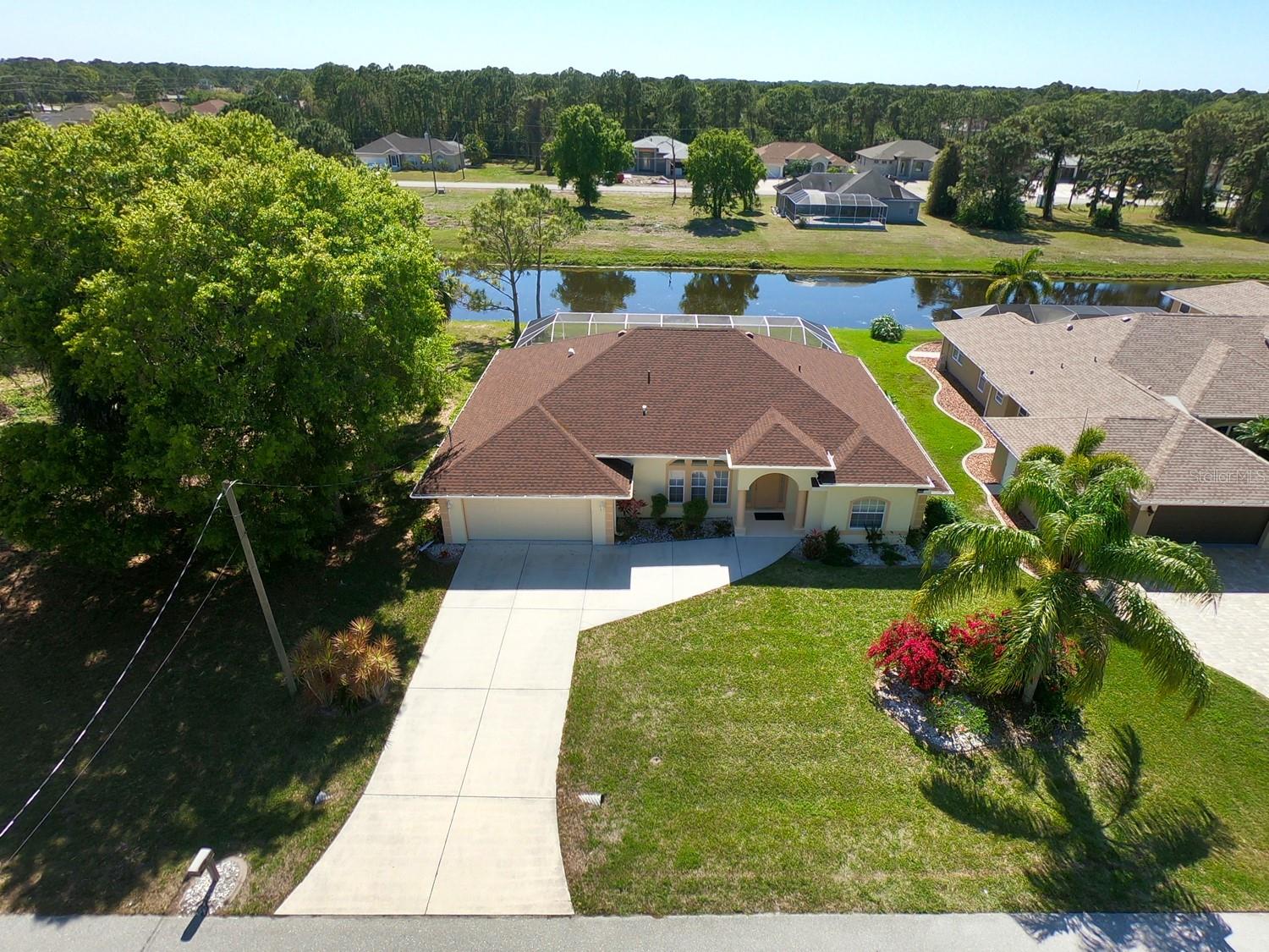 Available September-December 2025 only. Step into your own waterfront haven as you walk through the front door of this charming 3-bedroom home, where breathtaking views of the canal and Florida's wildlife greet you through the sliding glass doors overlooking the oversized lanai and pool with spa. This tranquil retreat offers the perfect blend of comfort, convenience, and natural beauty for your stay in Rotonda.
To your right, you'll find the den with two twin-sized beds, offering a cozy spot for relaxation or additional sleeping arrangements. Ahead lies the spacious great room, providing ample room to unwind while enjoying views of the pool, spa, and stunning sunsets. The master bedroom with ensuite awaits to the back right of the house, featuring a king-sized bed and a bath complete with double vanities, a soaking tub, and a stand-alone shower for ultimate relaxation.
To your left, as you enter the front door, you'll discover the beautiful dining area with a large window overlooking the front gardens of the house. The kitchen sits just off the great room, dining area, and dinette area at the back of the house, providing easy access to the lanai through sliding glass doors. The laundry room is conveniently located just outside the kitchen, while the two guest bedrooms and guest bath, which also serves as a pool bathroom, are situated on the left side of the house.
Entertainment options abound with a new 65" TV in the great room and smart TVs with the Xfinity app signed in available in the two bedrooms. Bikes and helmets are provided for your use, allowing you to explore the bike paths in Rotonda and the surrounding area, as well as the many attractions in this beautiful community.
With so many things to do in the area, from golfing at one of the 5 community courses to lounging on nearby sandy white beaches or boating in the intercoastal waterways and Gulf of Mexico, you're sure to find something to suit every interest. Pets will be considered with the pet fee paid but, please inquire first before booking your stay.
Experience waterfront living at its finest at this serene retreat in Rotonda. Book your stay today and make memories to last a lifetime.
Neighborhood
Rotonda West is a deed restricted community of mainly single family homes located on the Cape Haze peninsula just south of Englewood in Charlotte County in SW Florida.
Rotonda West is laid out in the shape of an incomplete wagon wheel with over 20,000 acres of greenbelts, fairways, ponds, lakes and 23 miles of waterways made up of seven distinct subdivisions (spokes in the wheel) comprising Oakland Hills, Pebble Beach, Pinehurst, Broadmoor, Long Meadow, White Marsh, and Pine Valley.
In the center of Rotonda West off Parade Circle there is a community park with tennis courts, nature trail, children's play area and BBQ. It is approximately a 20-minute drive to Englewood Beach. There are five golf courses within Rotonda West - The Palms, The Hills, The Links, Long Marsh and Pine moor).
Thirty miles of picturesque canals, lakes and ponds wind through the community and offer fishing and boating opportunities for its residents. A protected wetland preserve to the south prevents development of that area. Alligators, Great Blue Herons, Egrets, Bobcats, Raccoons, Armadillos, Gopher Tortoises, Turtles, and many other birds and animals inhabit the area. Rotonda West is a designated Bird Sanctuary.
