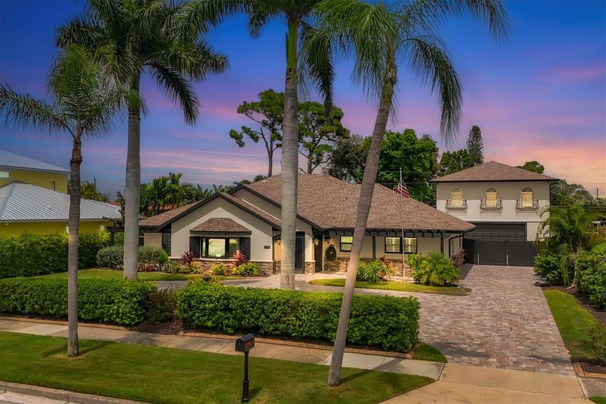 Immerse yourself in the pinnacle of luxury living within the upscale community, steeped in the rich history of Venice Island, minutes away from the ocean. Nestled on almost half an acre and surrounded by exotic landscaping, lies a grand estate home meticulously renovated to the highest standards and inspired by the exquisite interior with the plaster crown moldings and plaster medallion over the dining room. Upon entering, one’s gaze is captivated by the expansive open floor plan, contemporary kitchen, gorgeous luxury flooring, smooth textured ceilings and walls, and the allure of sliding glass doors leading to a pool embraced by lush landscaping and a beautiful waterfall. The living room is graced with an open plan. The kitchen was created with the thoughtfulness of entertaining and features a large multi-use island, superior cabinetry, granite countertops, a DUAL refrigerator, a modern cooktop, and lots of tall cabinetry for additional storage. The primary bedroom provides a scenic view of the backyard and features an elegant bathroom with dual sinks, a glass shower, and an indoor inground hot tub. The other side of the house provides two large bedrooms and two bathrooms that have been fully remodeled. Benefit from impact windows and doors, ensuring safety and efficiency. This home is being offered furnished, with a few seller exceptions. Public Water and Public Sewer. FULL PRIVACY. NO HOA OR CDD. The home blurs the lines between indoors and outdoor spaces with a glass sliding door, which allows for one large indoor/outdoor space. The resort space begins with the expansive, covered, and screened lanai with a beautiful waterfall. This one-of-a-kind Home is in the heart of Beautiful Venice Island, has high elevation and is NOT in a flood zone With a large Mother-in-law building, there is endless opportunity to use it as a separate residence built in 2005. Oversized 2-car garage. This Home offers only excellence with a fully remodeled home. The Master bedroom connected to a huge shower and hot tub, looking out at your very own large pool with its very own WATERFALL.This house has a full connection to a propane 500-gallon gas tank and a full house generator, all connected.A new circular paved drive-way with multiple car parking spaces. Experience true relaxation with a 5-minute walk from the beach.From sea to shore, the opportunities to explore and appreciate the great outdoors are endless. Charter a boat to catch a big one or drop a line off of Venice’s 700-foot-long fishing pier or at the South Jetty, which extends several hundred yards into the Gulf of Mexico. Enjoy the water while kayaking, paddleboarding, jet skiing, or parasailing.Venice, along Florida’s sand-covered Gulf Coast, offers 14 miles of some of the most magnificent beaches in the state. From only beaches to beaches that accommodate dogs to beaches on which you can hunt for shark’s teeth, Venice has it all. Don't miss this opportunity to own a piece of Floridian paradise. Schedule your private showing today before this gem of a home is gone.