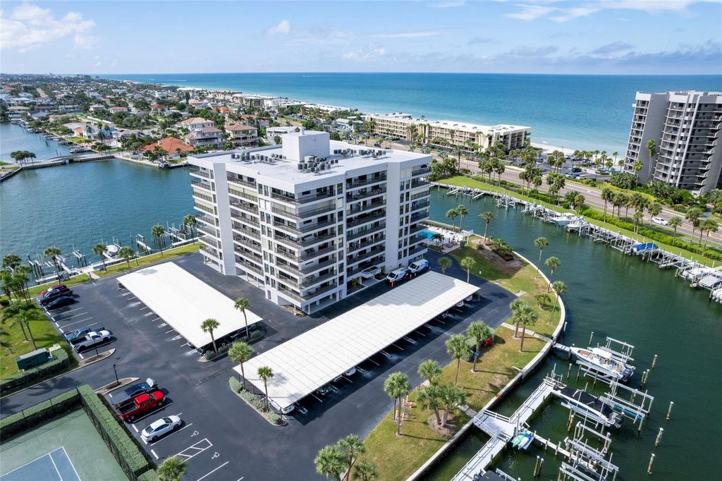 Photo of 1651 Sand Key Estates Court #77, Clearwater Beach, FL 33767 (MLS # TB8436255)